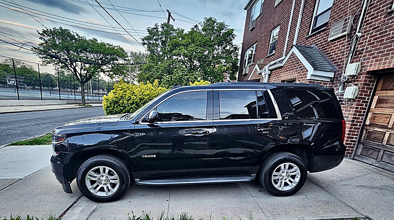 L & A Limo's black Chevrolet Tahoe parked and ready for service
